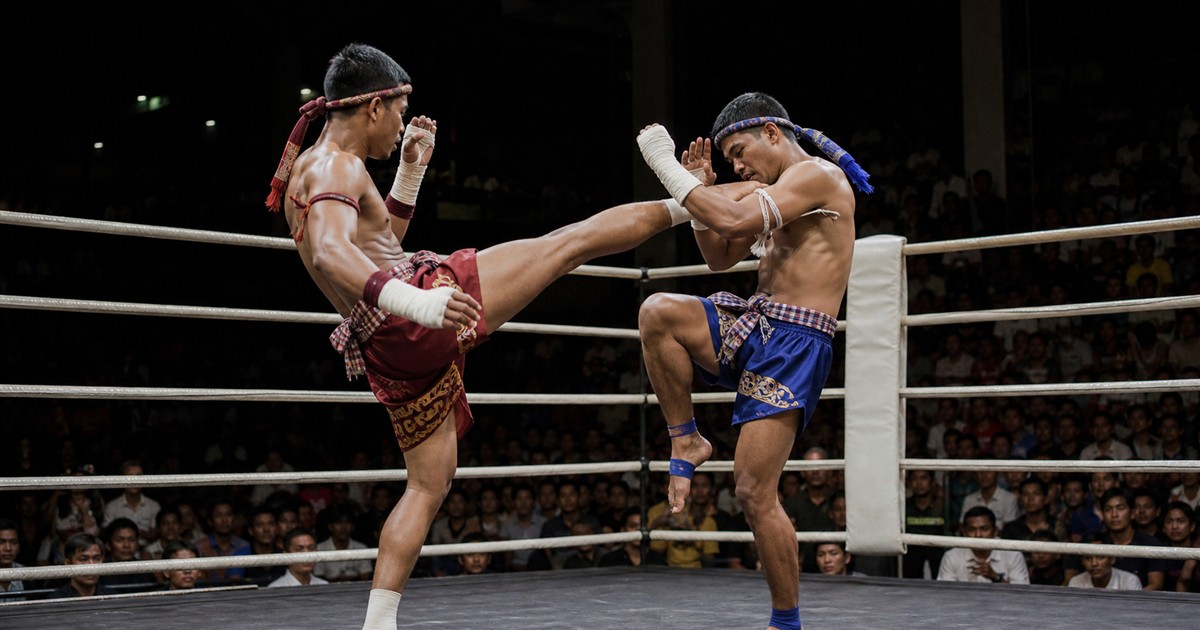 Kun Khmer athletes competing in a Phnom Penh arena